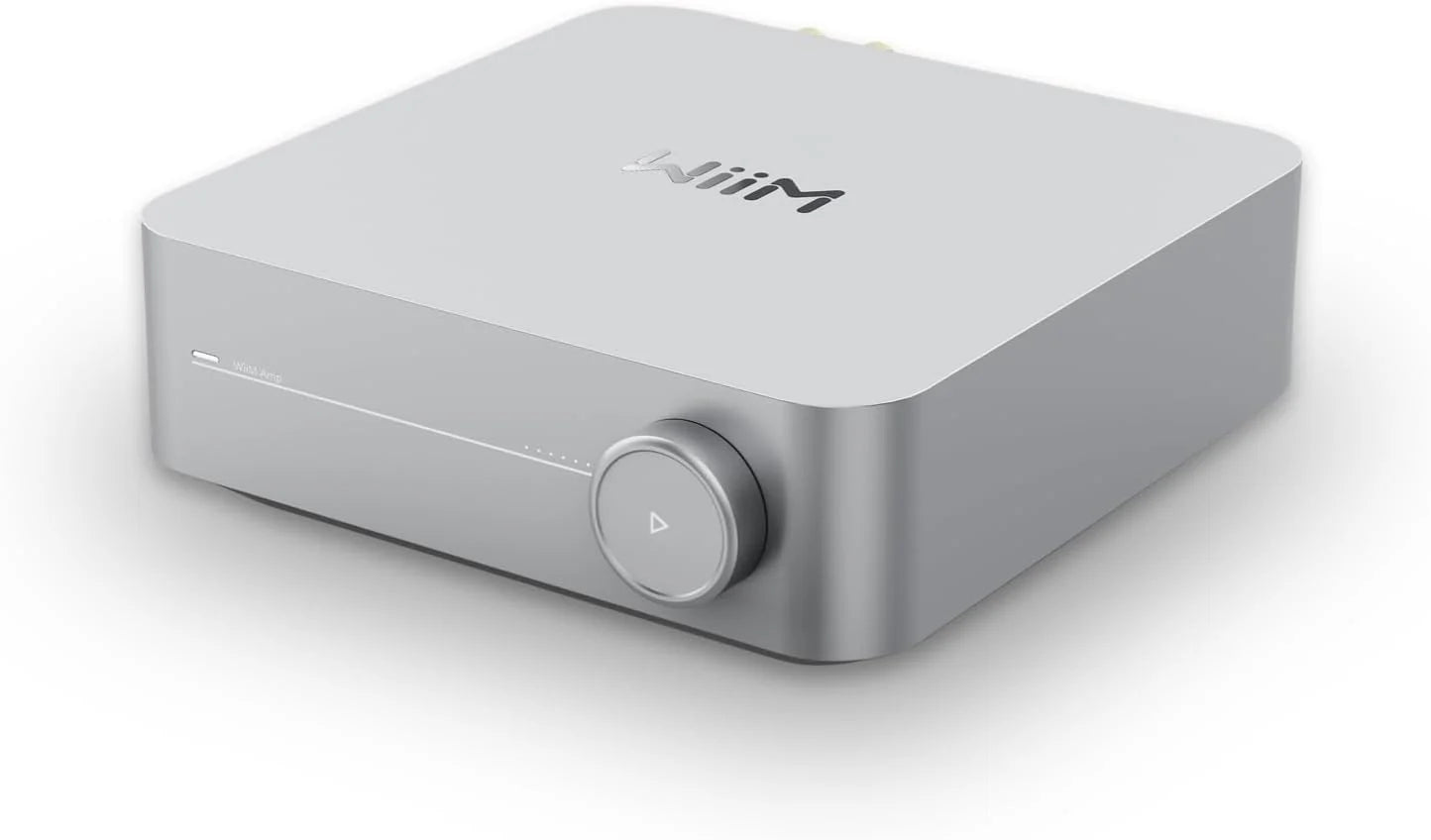 WiiM AMP Amplificator Stereo cu streaming 60W, vedere frontală unghi dreapta, culoare gri, buton volum.
