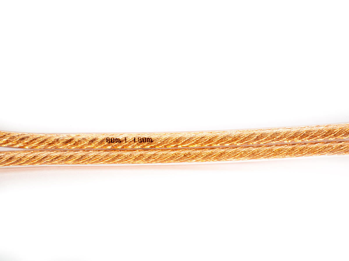 Cablu pentru boxe Wilson OFC, vedere laterală, cupru transparent, inscripție vizibilă pe izolație.