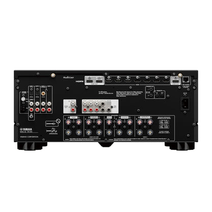 Spatele receptorului Yamaha RX-A4A, culoare neagră, arată conexiunile HDMI, rețea și ieșiri audio.