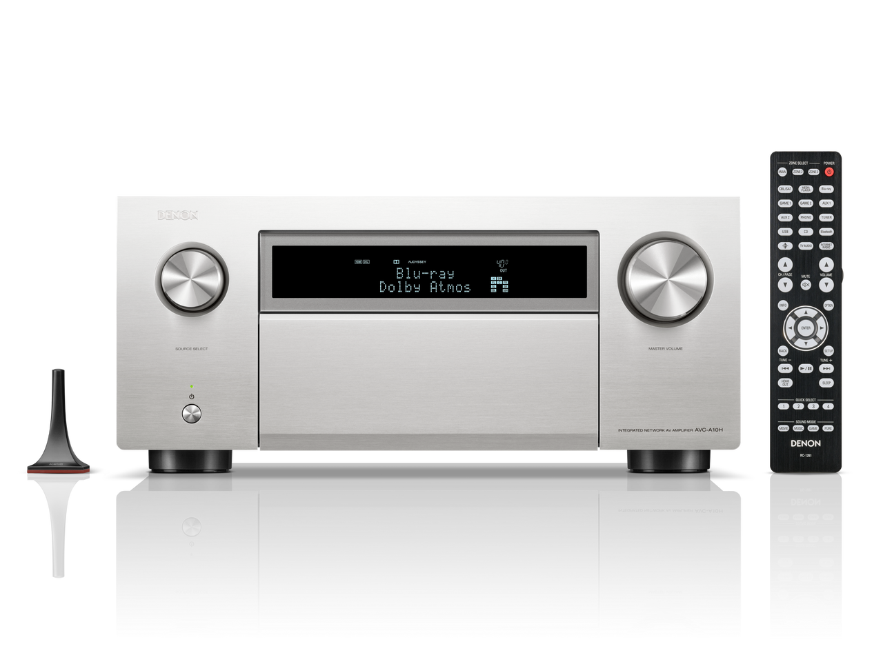 Denon AVC-A10H Receiver AV argintiu, vedere frontală. Afișaj digital, butoane volum și sursă, telecomandă.