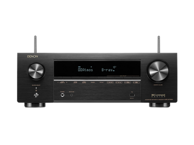 Receptor AV Denon AVR-X1700H, vedere frontală, negru, afișaj central cu text "Dolby Atmos", butoane volum și selectare sursă.