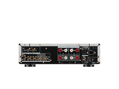Panoul din spate al Marantz Model 50 Amplificator argintiu, cu multiple intrări audio și conectori difuzoare.