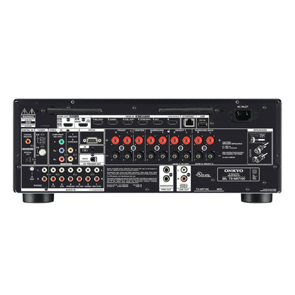 Panou spate negru Onkyo TX-NR7100 Receiver AV cu multiple porturi HDMI, audio, USB și conexiuni boxe.