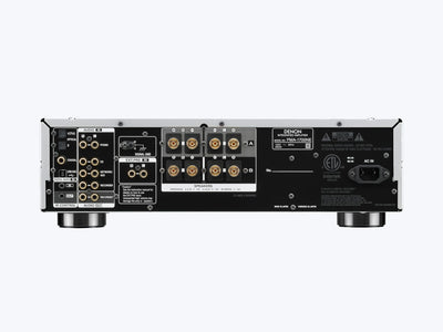 Spatele amplificatorului Denon PMA-1700NE argintiu, cu porturi audio, conexiuni difuzoare și alimentare.