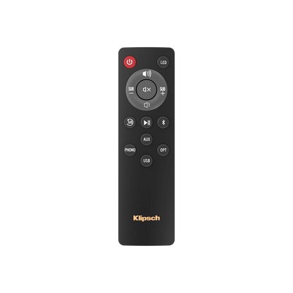 Telecomandă neagră pentru boxe active Klipsch R-50PM, cu butoane pentru volum, surse și subwoofer.